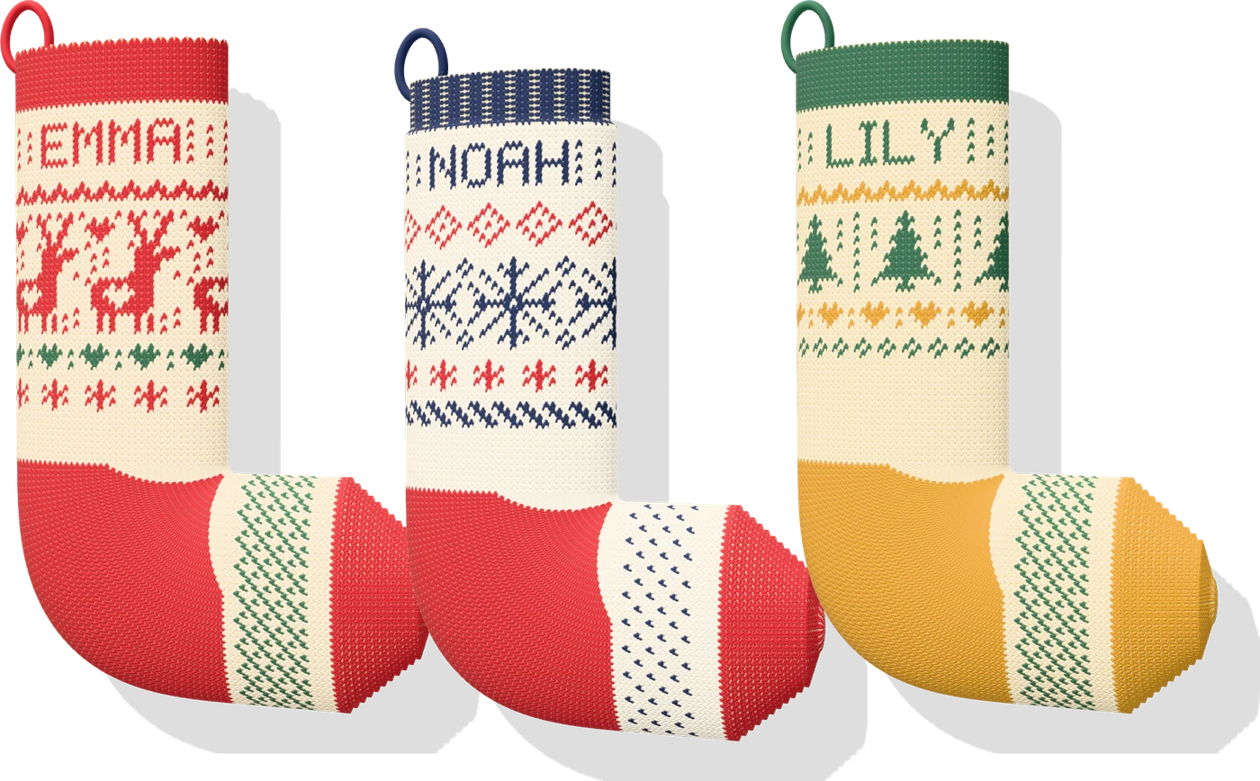 Three Fair Isle Christmas stockings with the names Emma, Noah and Lily knitted in, designed in Purlgrid Studio